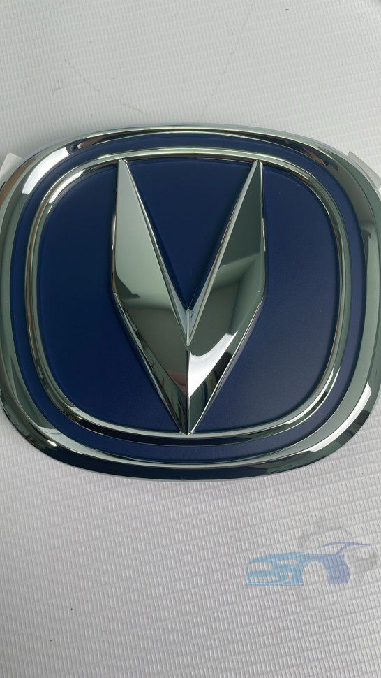 Эмблема решетки радиатора V3011310100 Changan Alsvin