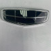 Эмблема передняя 6013037400 Geely Monjaro KX11