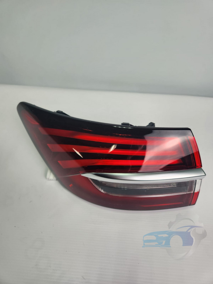 Фонарь задний наружный левый 7057015900 Geely Coolray